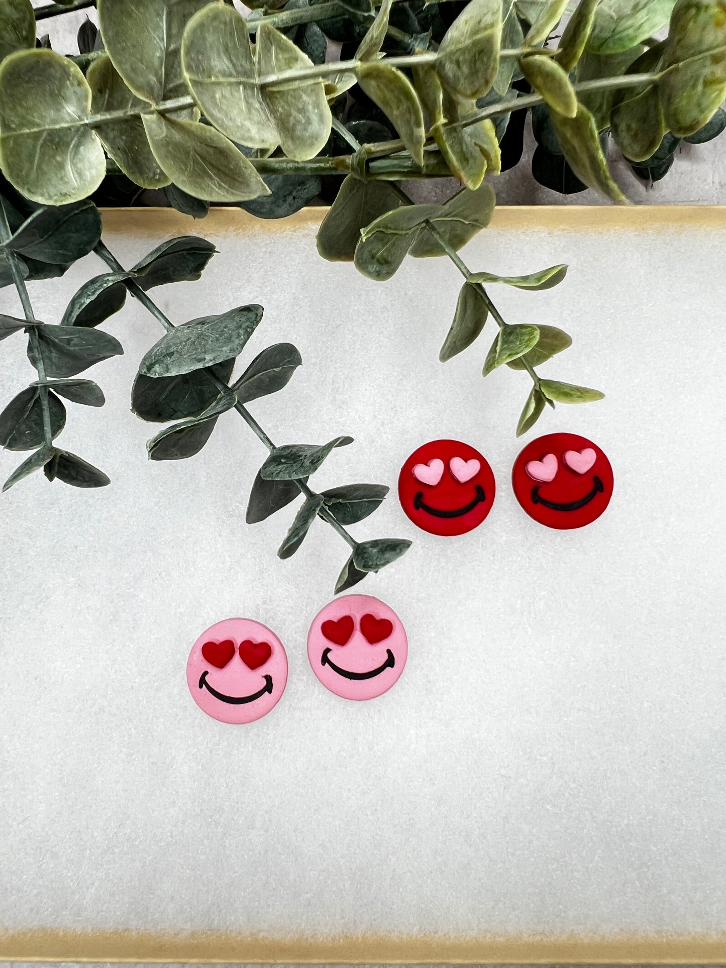 Vday smiley studs