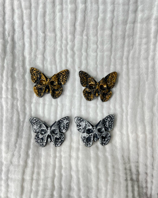 Skull butterfly stud